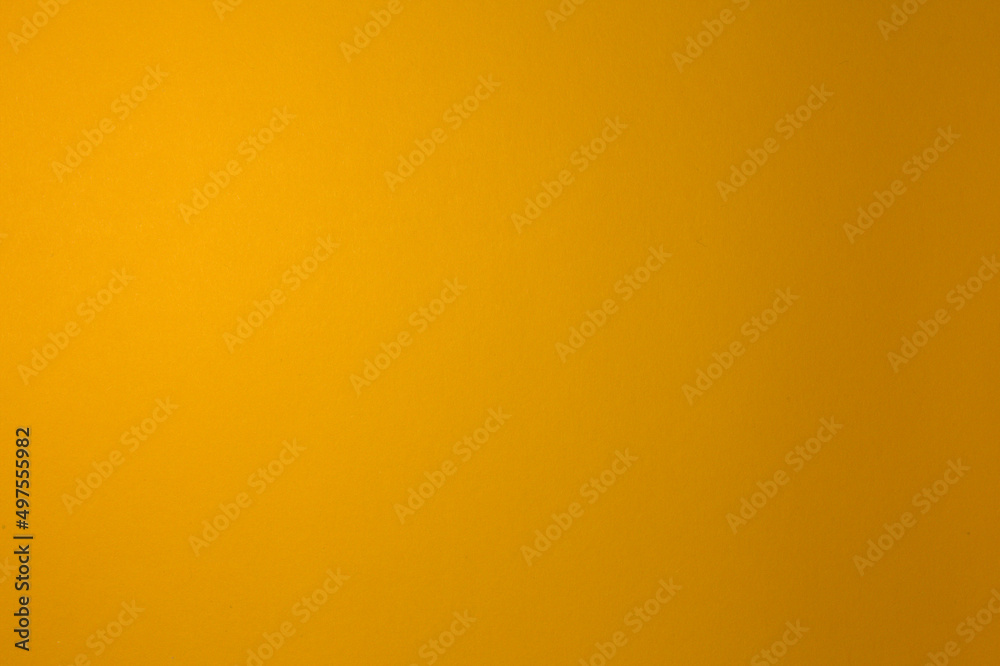 Yellow is dark. Paper background. Illuminated evenly. Homogeneous. Yellow is dark. Paper background. Illuminated evenly. Homogeneous.