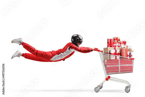 Racer with a helmet flying with a shopping cart full of wrapped presents © Ljupco Smokovski