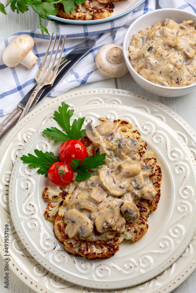 Cauliflower steak with mushrooms. Cauliflower steak with mushrooms.
