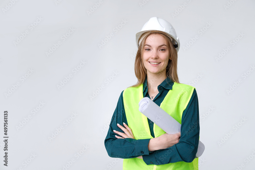 Woman engineer builder in white hard hat with blueprints and tablet folder Woman engineer builder in white hard hat with blueprints and tablet folder