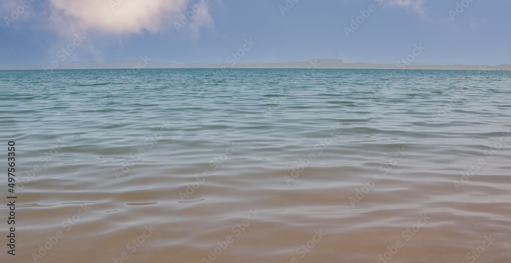 Background from water and sky. Water texture with copy space.