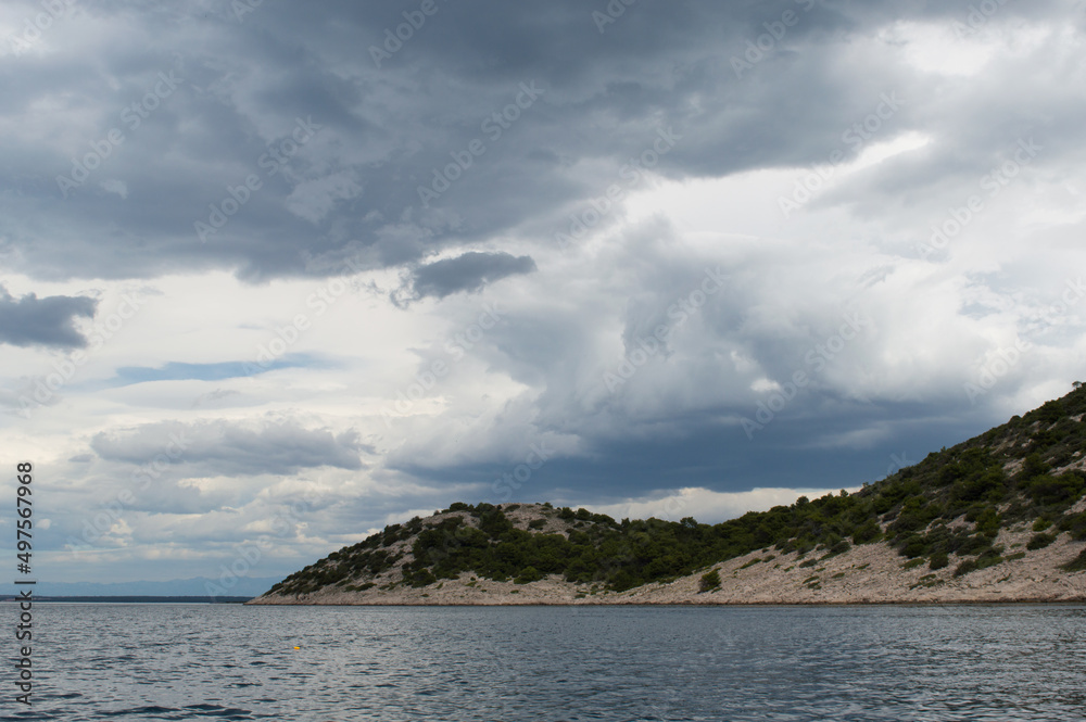 Cloudy sky with various shades of blue color over the Adriatic sea, in Dalmatia, Croatia