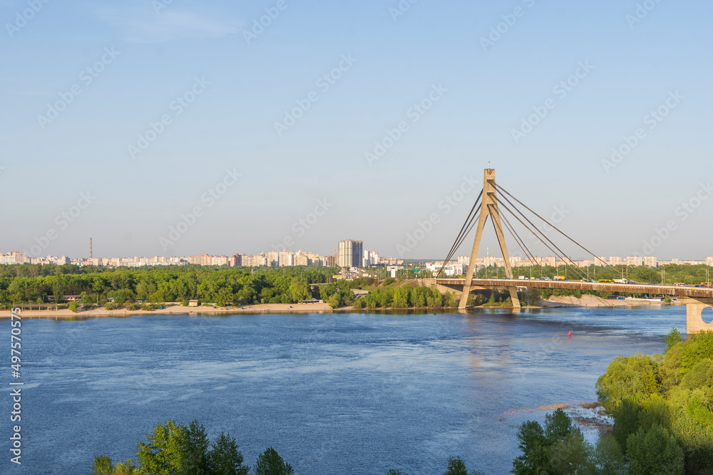Summer landscape of the city of Kiev with a view of the Moscow bridge and the Dnieper River