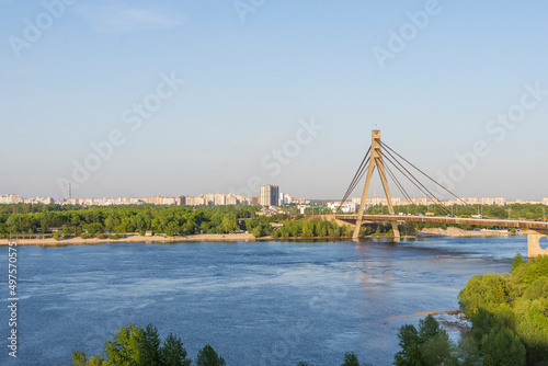 Summer landscape of the city of Kiev with a view of the Moscow bridge and the Dnieper River © Artbovich