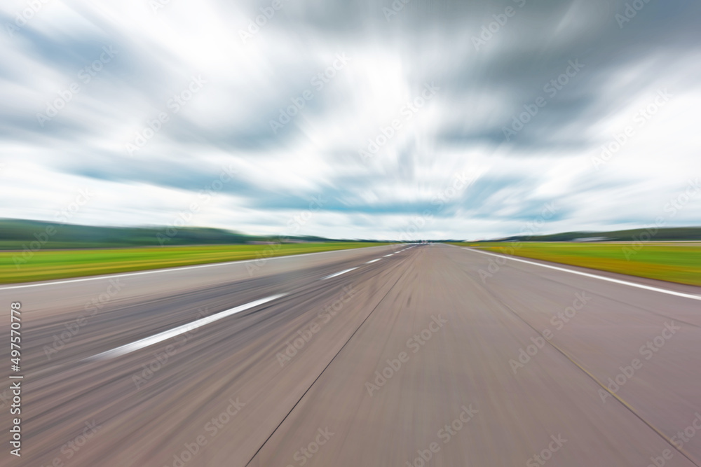 Road runway in motion blurred abstract speed display in perspective. Road runway in motion blurred abstract speed display in perspective.