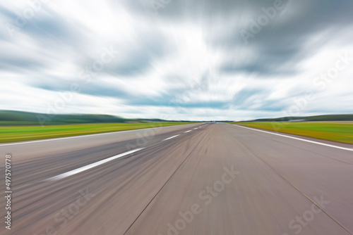 Road runway in motion blurred abstract speed display in perspective.