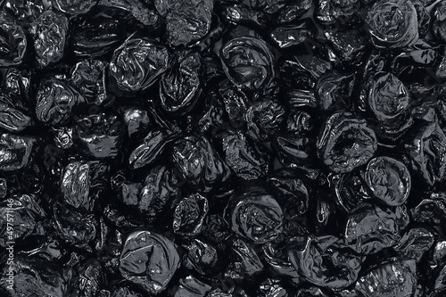 Dried prunes . Dried food. Texture background.