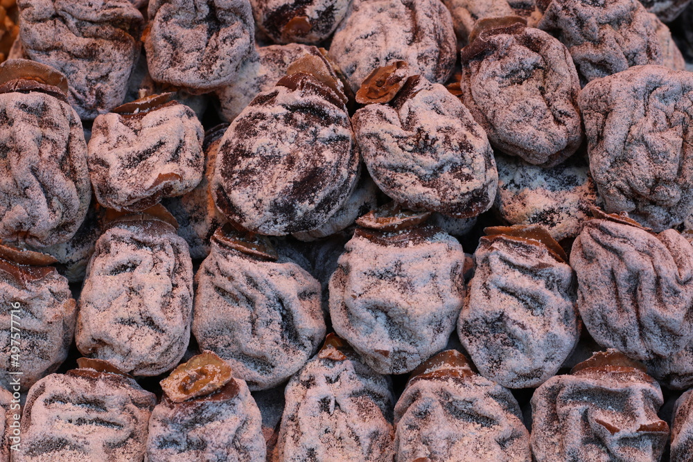 Persimmon grown in Trabzon is naturally dried in sunlight and sold in markets. Paradise Palm Persimmon grown in Trabzon is naturally dried in sunlight and sold in markets. Paradise Palm