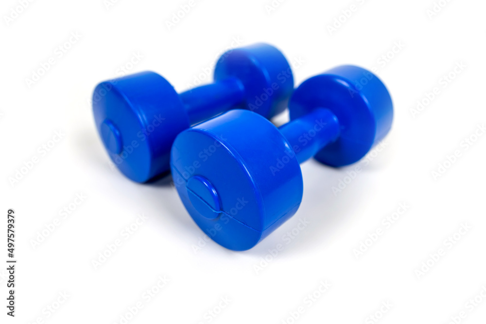Blue dumbbells isolated on white Blue dumbbells isolated on white