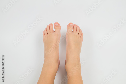 children's feet on white
