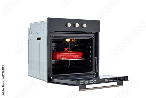 Black oven with open door and red baking dish, 45 degree view