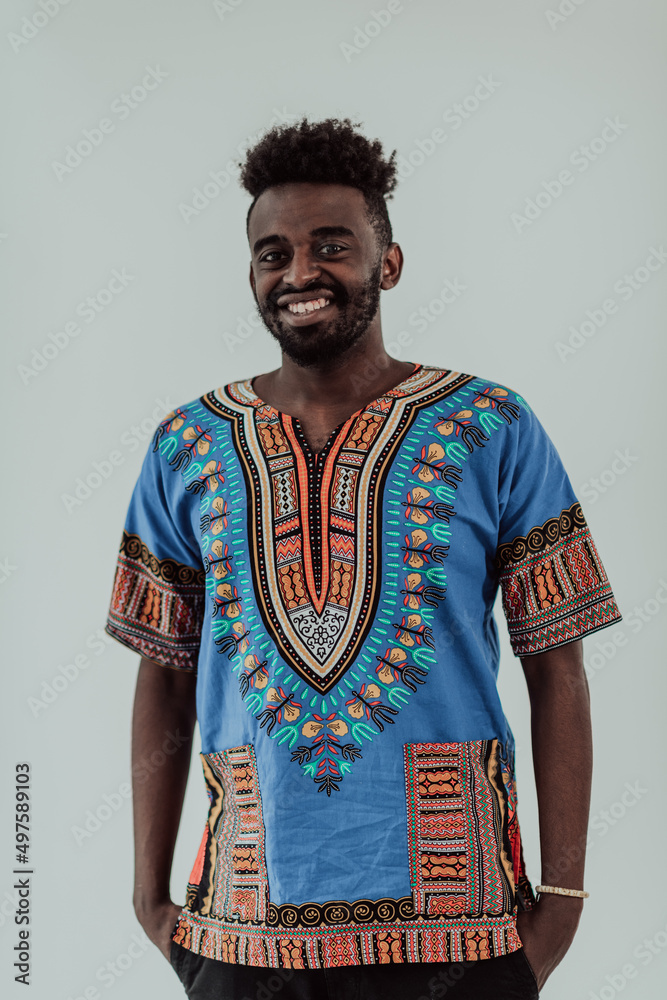 Obraz premium Portrait of a handsome African black man in traditional Islamic Sudan fashion clothes.