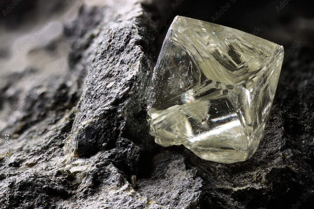 0.55 ct octahedral diamond from South Africa nestled in kimberlite 0.55 ct octahedral diamond from South Africa nestled in kimberlite