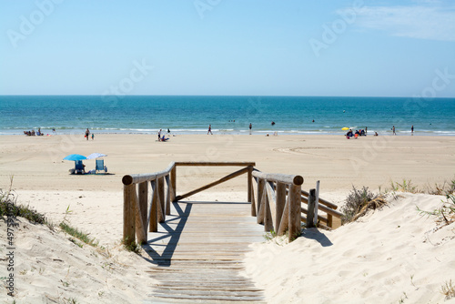 Fototapeta Naklejka Na Ścianę i Meble -  Golden sandy beaches near Sanlucar de Barrameda, small Andalusian town, Spain