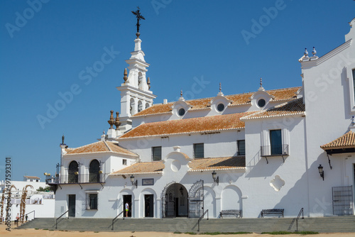 White houses and sandy street in small town El Rocio in Donana National park in Andalusia, Spain