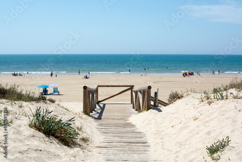 Golden sandy beaches near Sanlucar de Barrameda, small Andalusian town, Spain photo