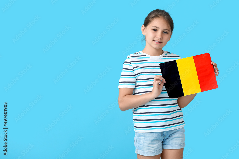 Little girl with flag of Belgium on color background Little girl with flag of Belgium on color background