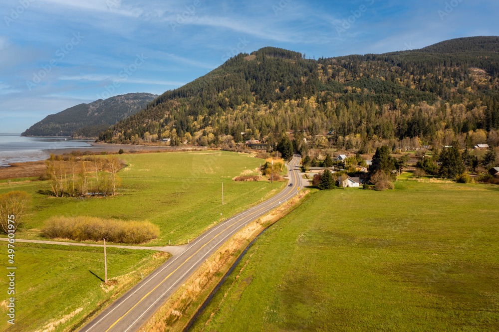 Aerial View of Chuckanut Drive. As you approach the base of the Chuckanut Mountains and just as the road begins its climb, you’ll find the small community of Blanchard, founded in 1887. Aerial View of Chuckanut Drive. As you approach the base of the Chuckanut Mountains and just as the road begins its climb, you’ll find the small community of Blanchard, founded in 1887.