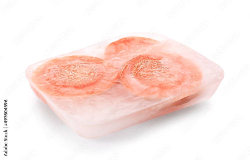 Fresh carrot slices frozen in ice on white background Fresh carrot slices frozen in ice on white background