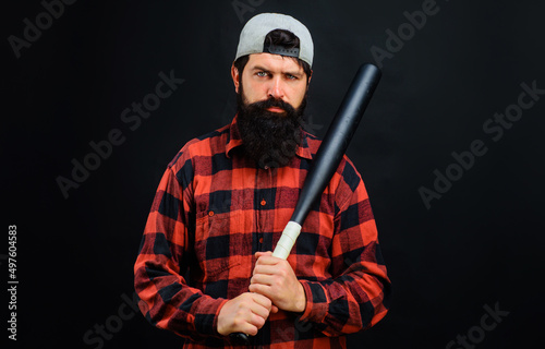 Bearded man with baseball bat. Sport, training, healthy lifestyle. Professional baseball player in cap.