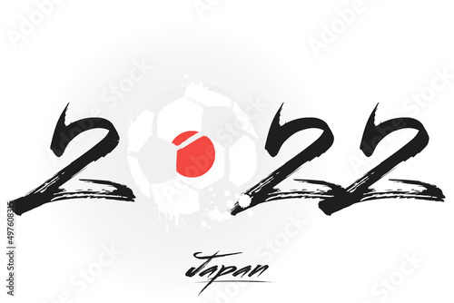 Numbers 2022 and a abstract soccer ball painted in the colors of the Japan flag. 2022 and flag of Japan in the form of a soccer ball made of blots. Vector illustration on isolated background