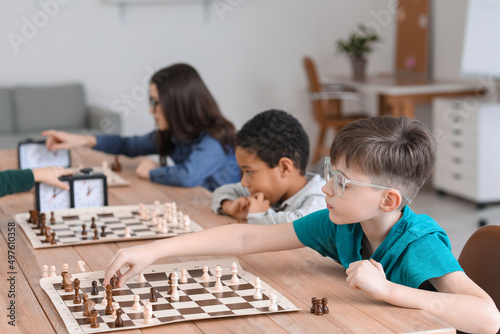 Little children playing che...