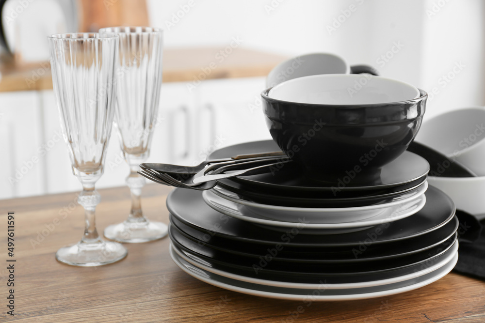 Set of clean tableware in kitchen Set of clean tableware in kitchen