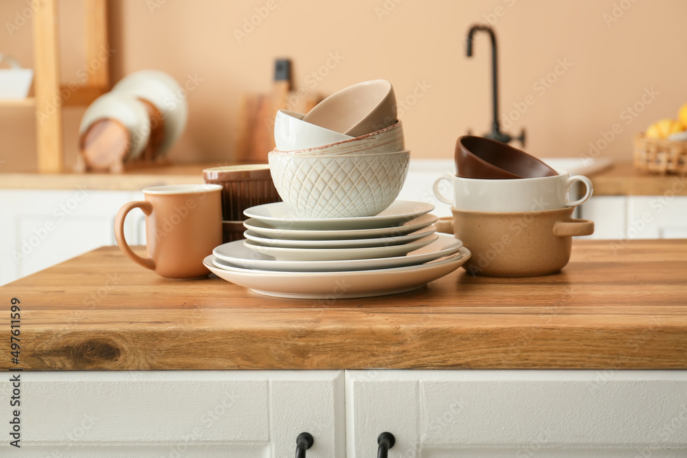 Set of clean tableware in kitchen Set of clean tableware in kitchen