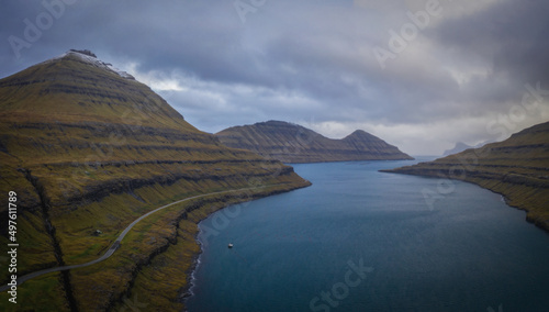 Faroe Islands  Eysturoy Island around Elduvik near Vesturdalsa. Dramatic weather  november 2021. Aerial drone view.