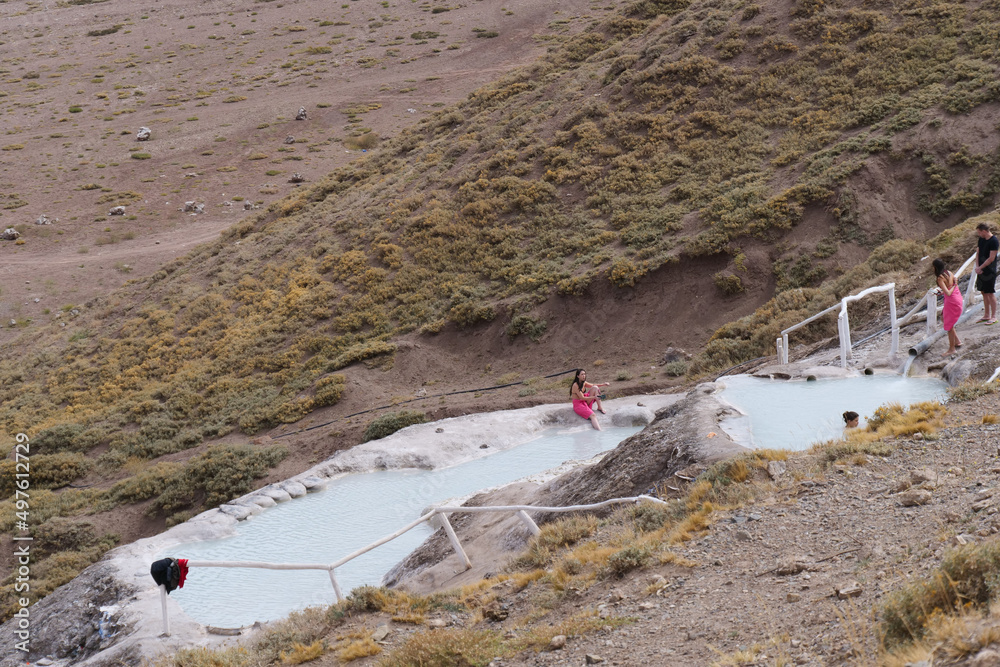 Tourist bathing in the Thermal water pools at Termas Valle de Colina