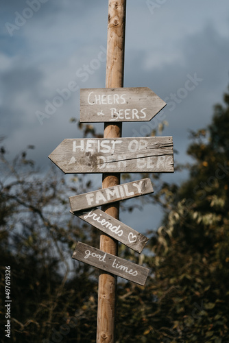 Wedding direction sign in wood photo