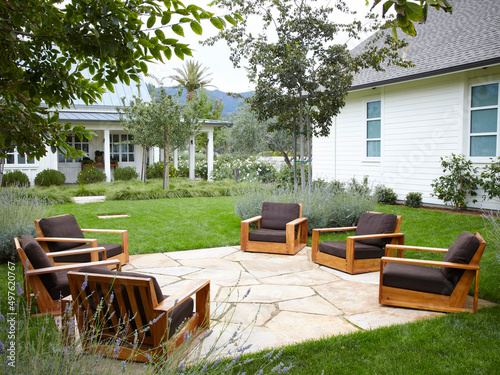 Architecture image of outdoor resort lounge patio area and lawn