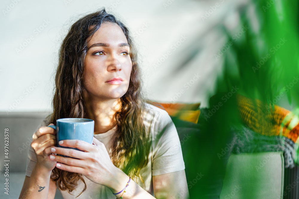 Woman holding cup of tea or coffee Woman holding cup of tea or coffee