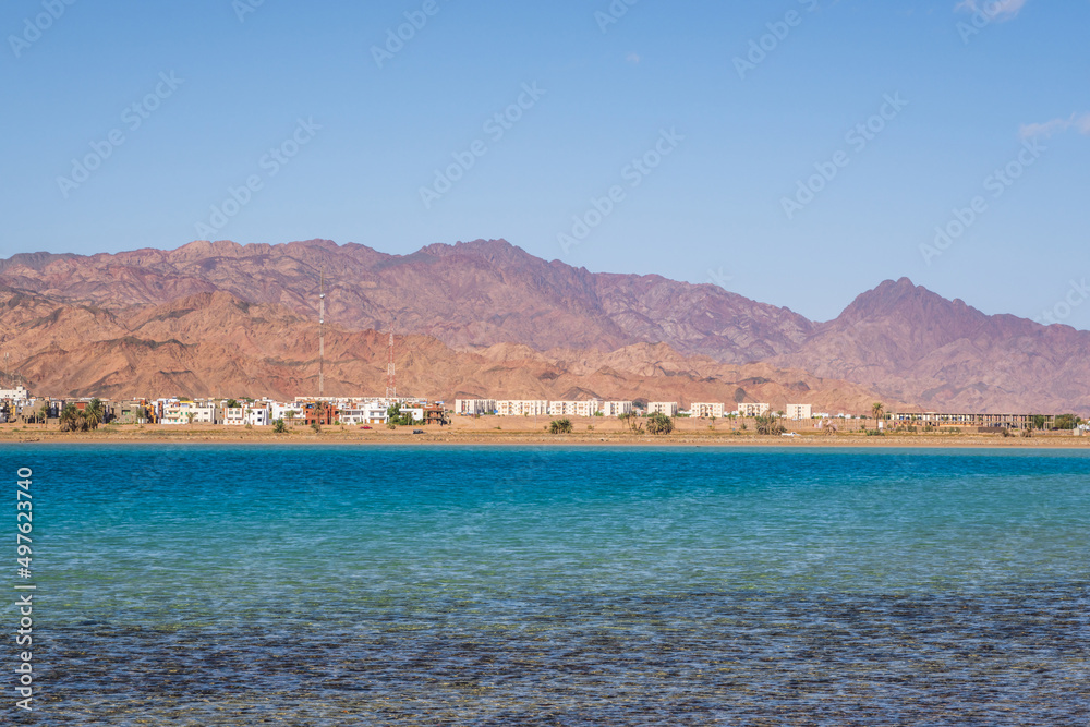 panorama in mountain range at sinai egypt similar to Martian landscapes with sea view and old town