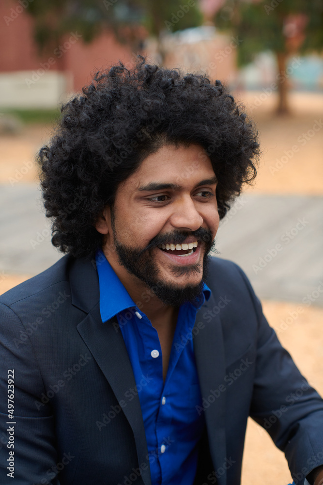 Portrait of happy young man laughing Portrait of happy young man laughing