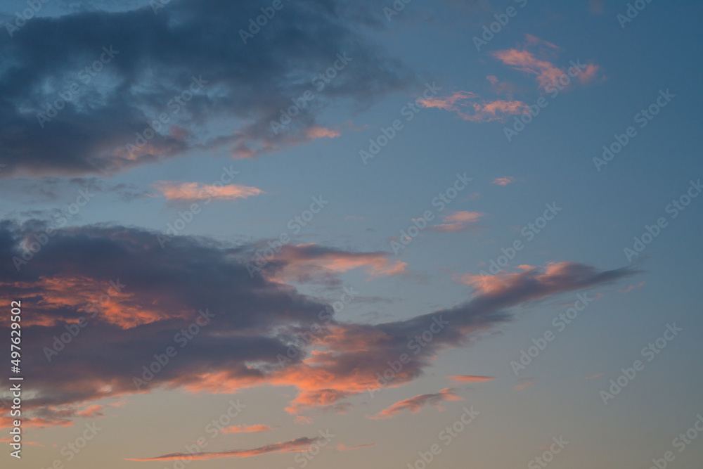 Texture of a red blue sky at sunset after rain