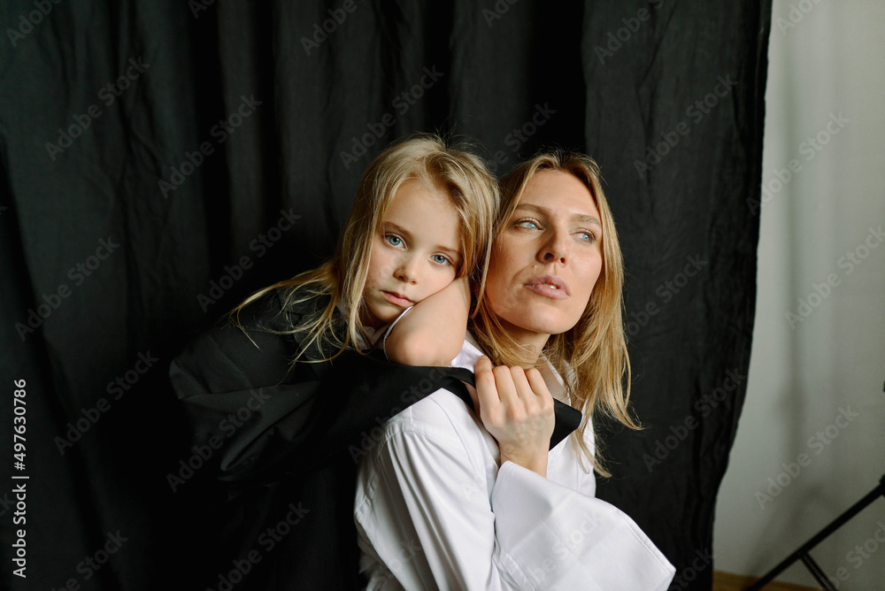 portrait of woman and little girl portrait of woman and little girl
