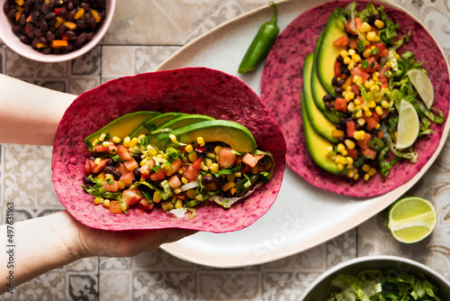 Vegan food: Mexican vegetable tacos with beet tortilla photo