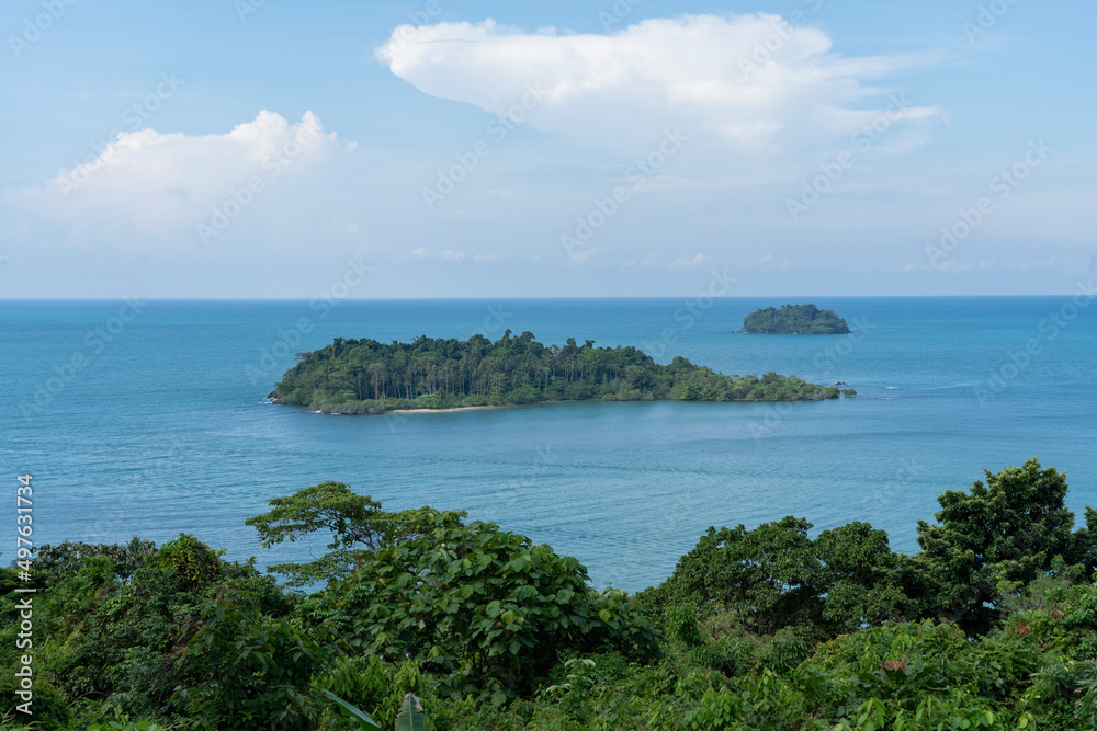Small tropical islands in the blue sea. Small tropical islands in the blue sea.