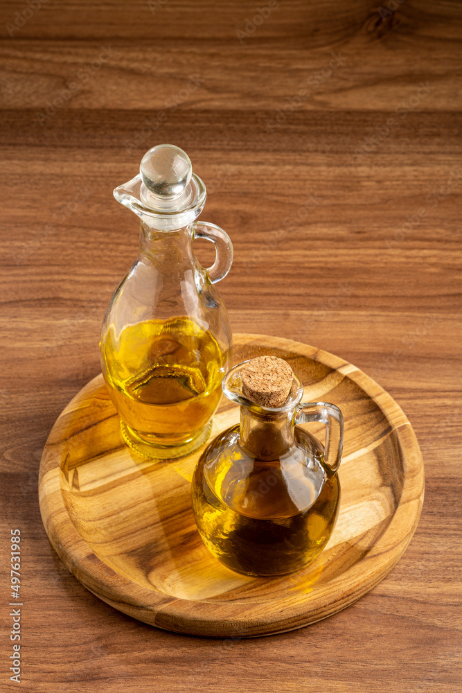 Glass cruet. Olive oil in a glass cruet. Glass cruet. Olive oil in a glass cruet.