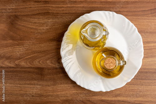 Glass cruet. Olive oil in a glass cruet.