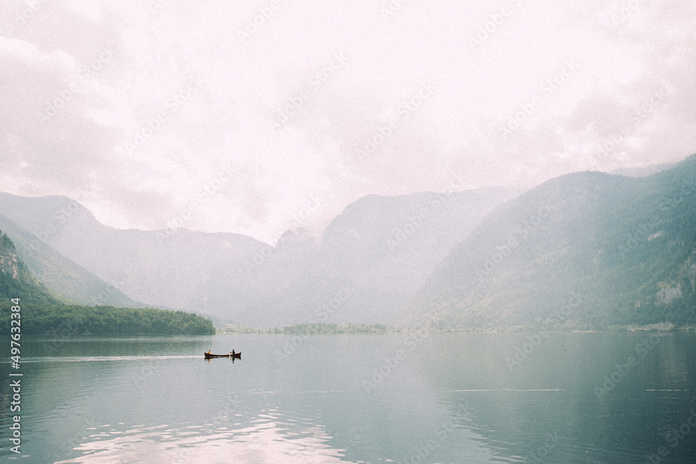 A boat on the lake in the mountains