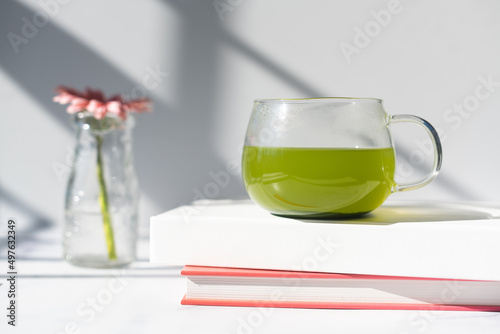 Glass of matcha green tea  photo