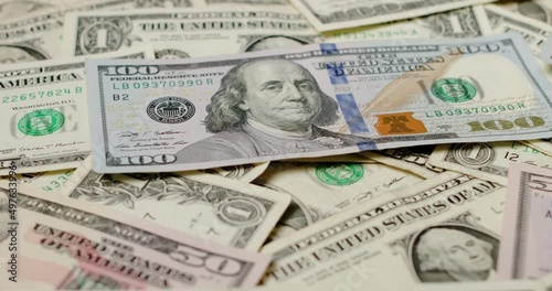 Wallpaper Mural US Dollar banknotes, one hundred and one US Dollar bills. Dollar Inflation concept Torontodigital.ca