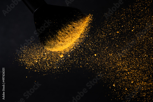 Make up brushes with golden face powder