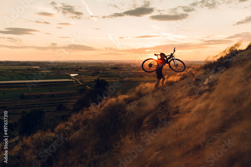 mountain biker at sunset photo