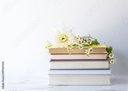 Beautiful flowers and books