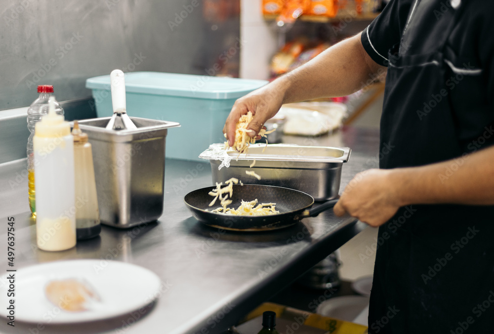 Meal preparation in professional kitchen Meal preparation in professional kitchen