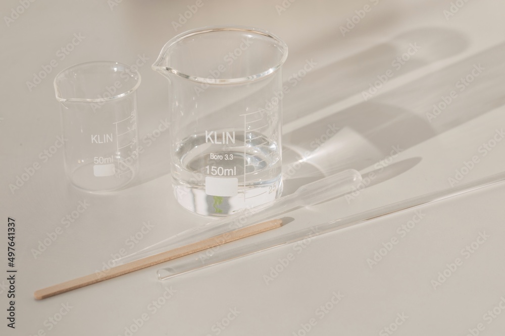 Beakers and laboratory tools on table
Beakers and laboratory tools on table