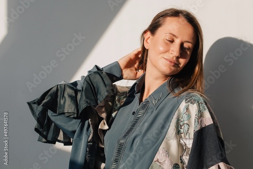 Dreamy woman in upcycling clothes   photo